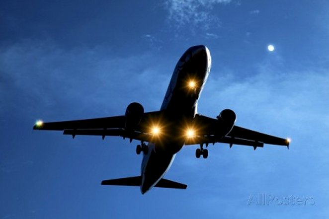 Airbus A320 Airliner Landing At Night