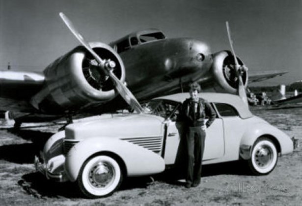 Amelia Earhart with Plane and Car