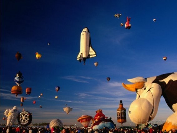 Space Shuttle and Cow Shaped Balloons at Balloon Fiesta, Albuquerque, New Mexico, USA